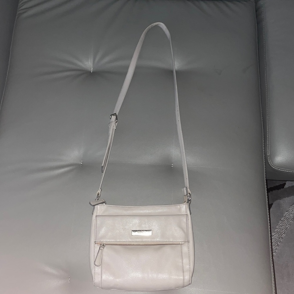 Nine West grey shoulder bag , adjustable to any size , spacious.